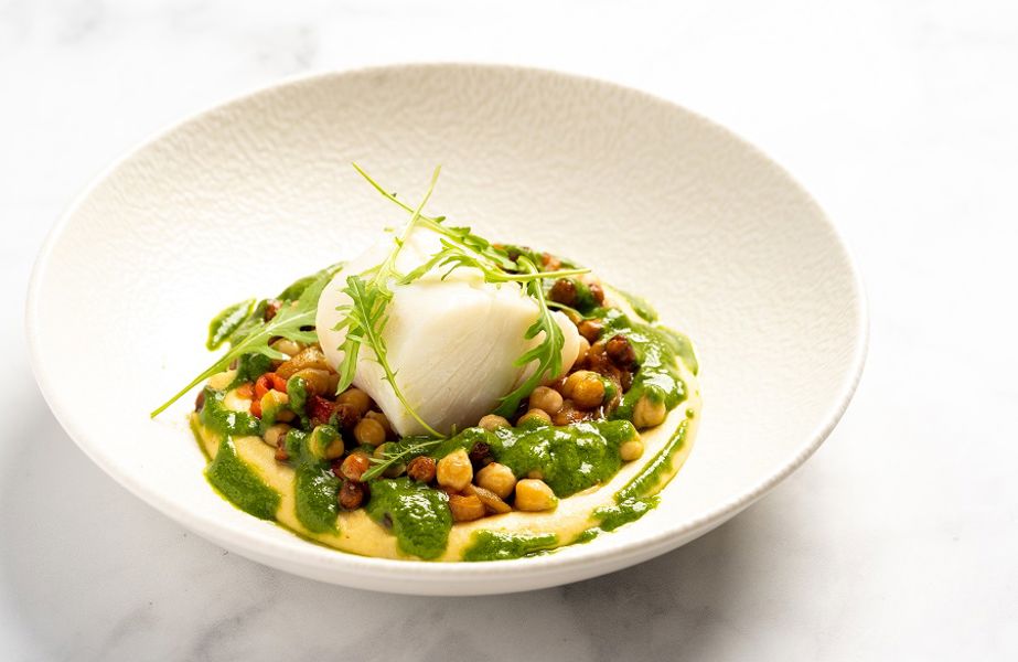 Roasted cod with chickpea, pipperade and rocket pesto