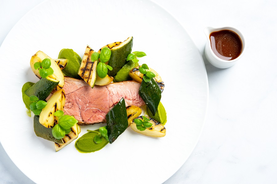 Roasted lamb rump, courgette, grilled potatoes and vegetable demi-glace