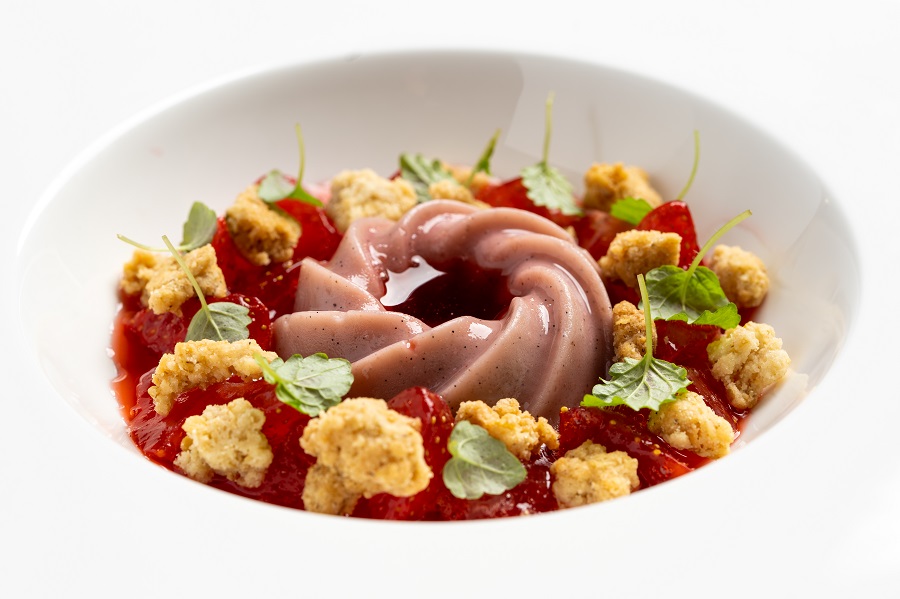 Strawberry panna cotta with compressed strawberries strawberry consommé and hobnob crumb