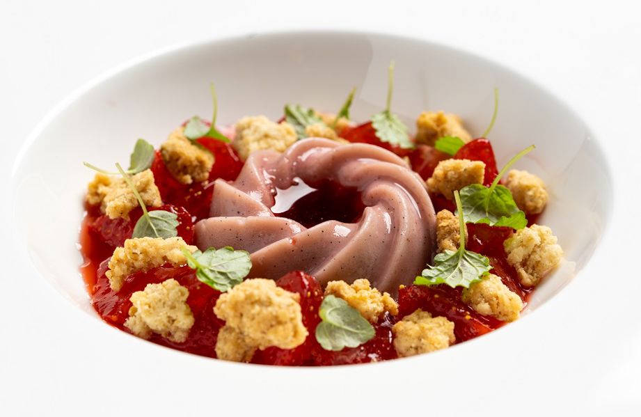 Strawberry panna cotta with compressed strawberries strawberry consommé and hobnob crumb