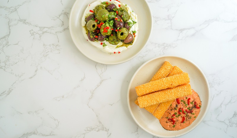 Green harissa olives with labneh