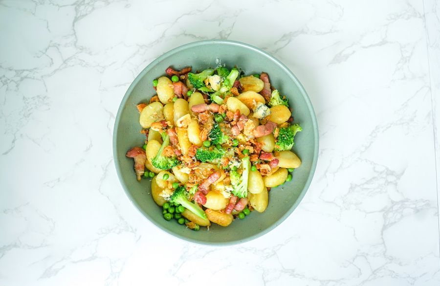 Gnocchi with broccoli, peas, pancetta and blue cheese